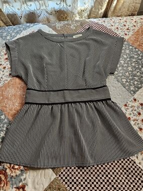 Woman Black and White Striped Peplum Dress